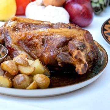 Roast lamb shoulder, potatoes and chimichurri